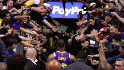 PHOENIX, ARIZONA - NOVEMBER 12: LeBron James #23 of the Los Angeles Lakers walks off the court past fans following the NBA game against the Phoenix Suns at Talking Stick Resort Arena on November 12, 2019 in Phoenix, Arizona. The Lakers defeated the Suns 123-115.