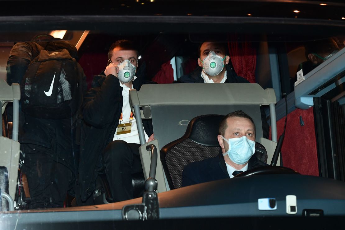 Ludogorets players wear protective face masks as they arrive at the San Siro ahead of their Europe League game against Inter MIlan, which was played behind closed doors.