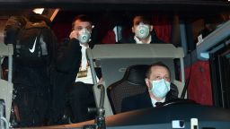 TOPSHOT - Players of Ludogorets wear protective face masks as a safety measure against the COVID-19, the novel coronavirus, as they sit in a bus on their way to compete in the UEFA Europa League round of 32 second-leg football match between Inter Milan and Ludogorets Razgrad on February 27, 2020, in Milan. (Photo by Miguel MEDINA / AFP) (Photo by MIGUEL MEDINA/AFP via Getty Images)