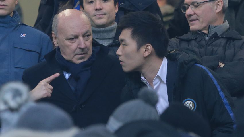 MILAN, ITALY - DECEMBER 15:  FC Internazionale president Steven Zhang (R) speaks with new CEO of FC Internazionale Giuseppe Marotta prior to the Serie A match between FC Internazionale and Udinese at Stadio Giuseppe Meazza on December 15, 2018 in Milan, Italy.  (Photo by Emilio Andreoli/Getty Images )