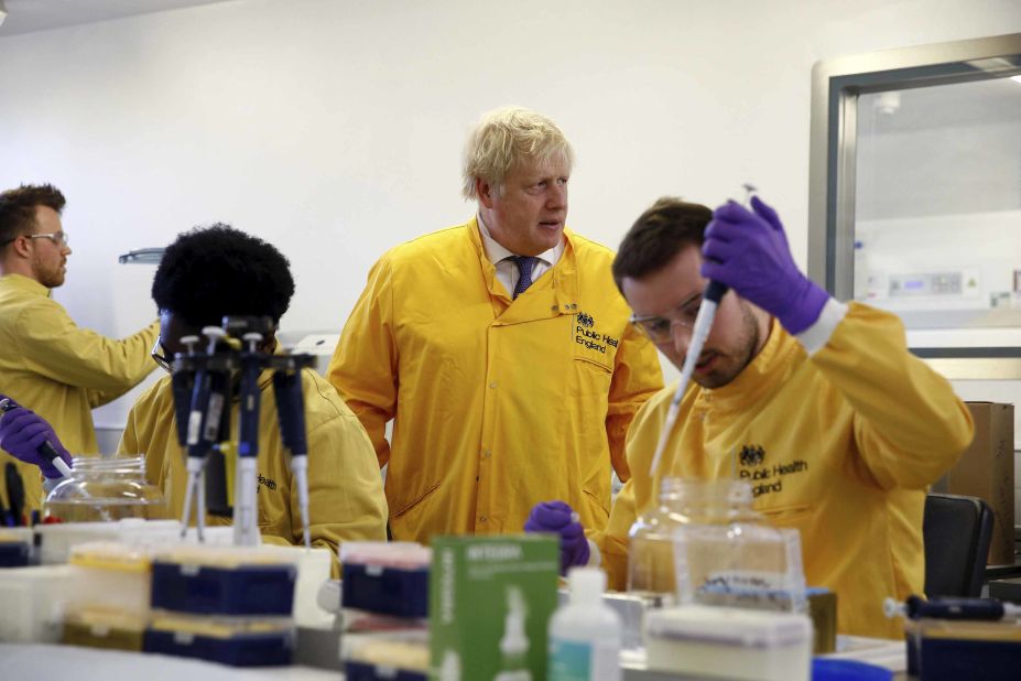 British Prime Minister Boris Johnson visits a London laboratory of the Public Health England National Infection Service.