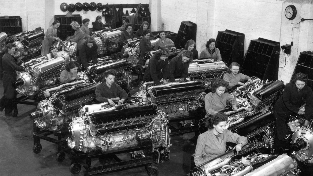 In 1942, these factory workers cleaned Merlin engines to be used in bombers and fighter aircraft.