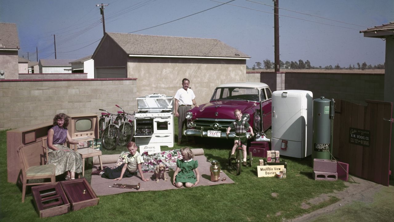 An American family, posing in their yard in Los Angeles in 1952.