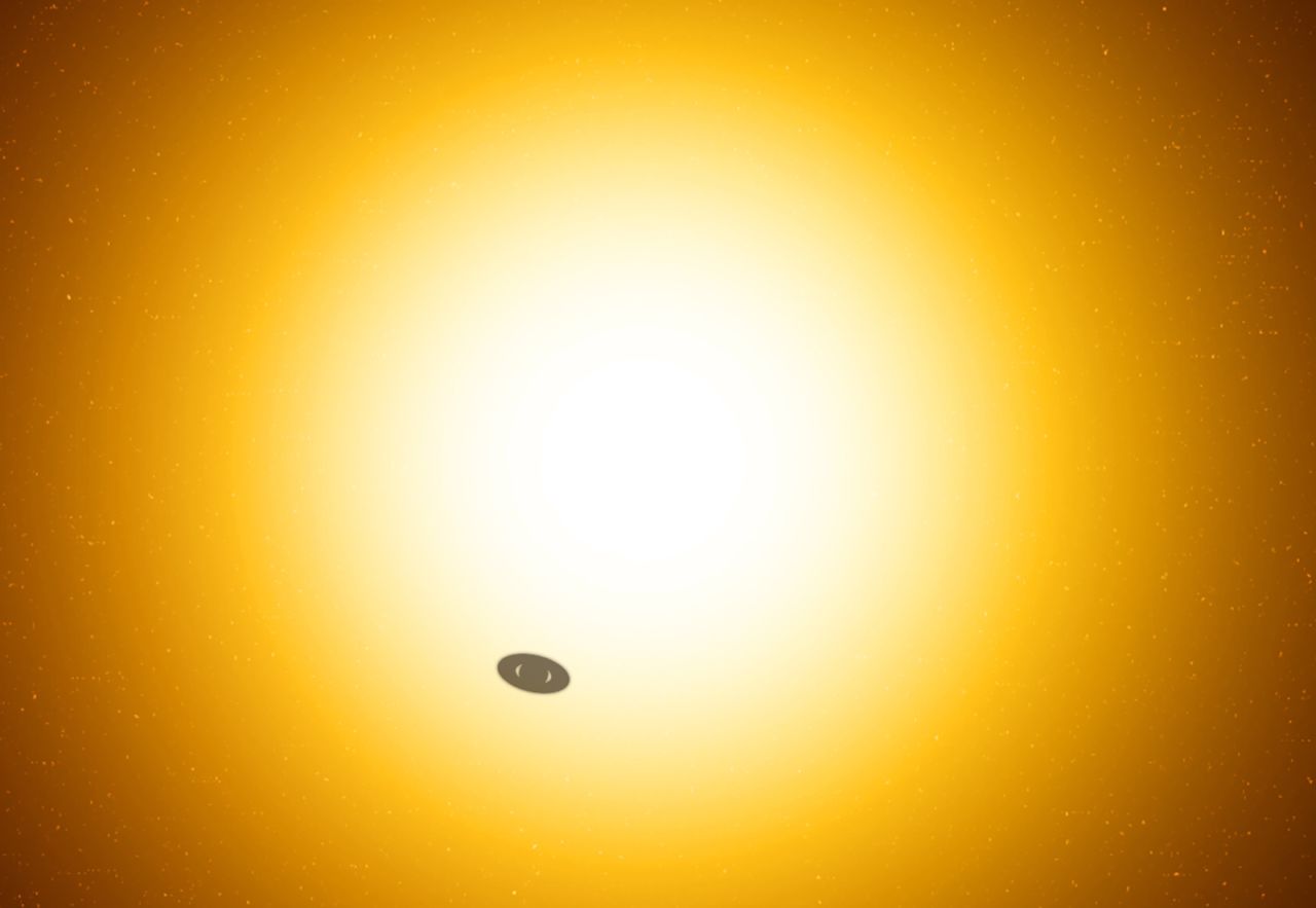 This is an artist's concept of a ringed planet passing in front of its host star. It shows how "puffy" a ringed planet may look to us from afar.