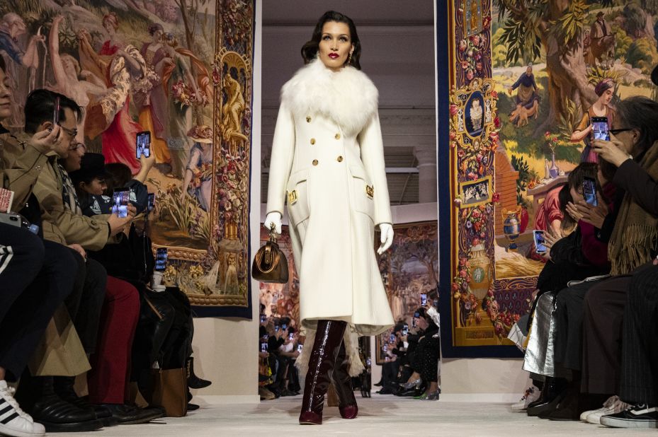 Bella Hadid walks in a white winter coat for Lanvin Autumn-Winter 2020/21
