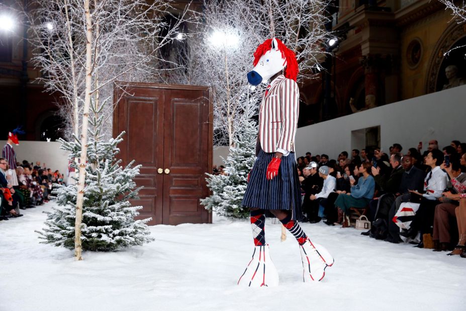 A model dressed as a preppy horse on stilts at Thom Browne AutumnWinter 2020/21