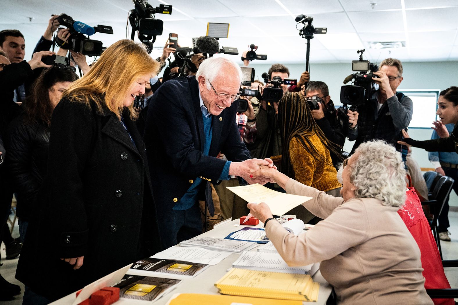 Sanders and his wife, Jane, check in to vote in Burlington, Vermont, on Tuesday.