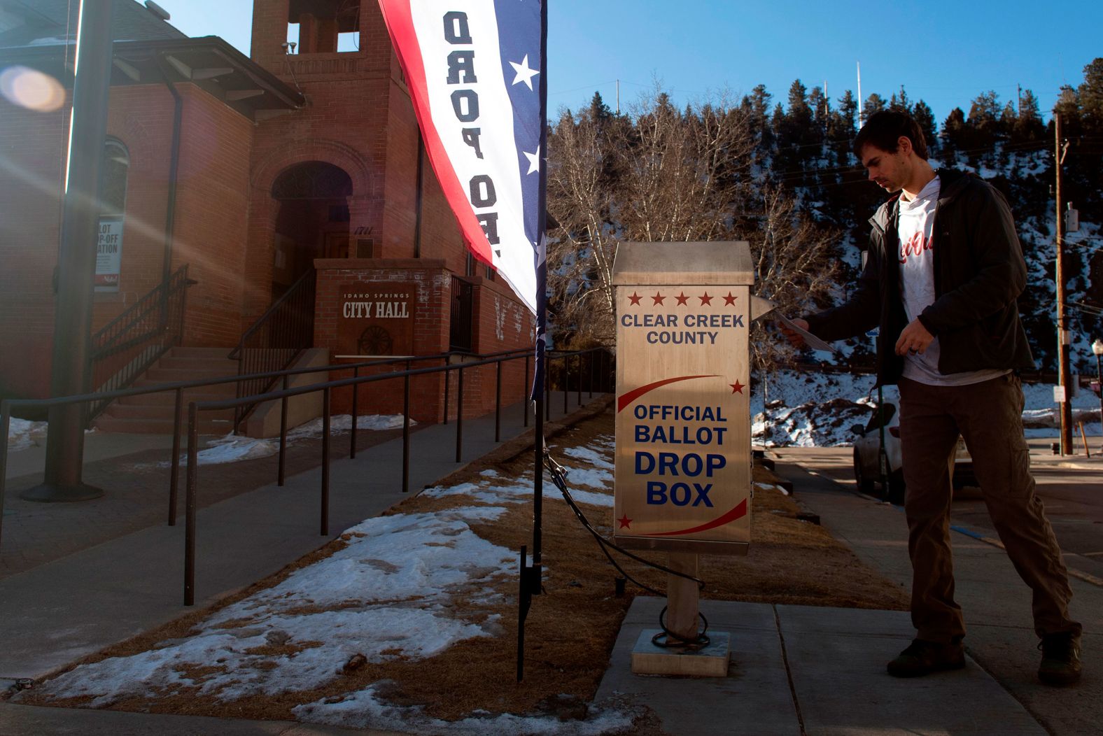 A voter drops off his ballot in Idaho Springs, Colorado.