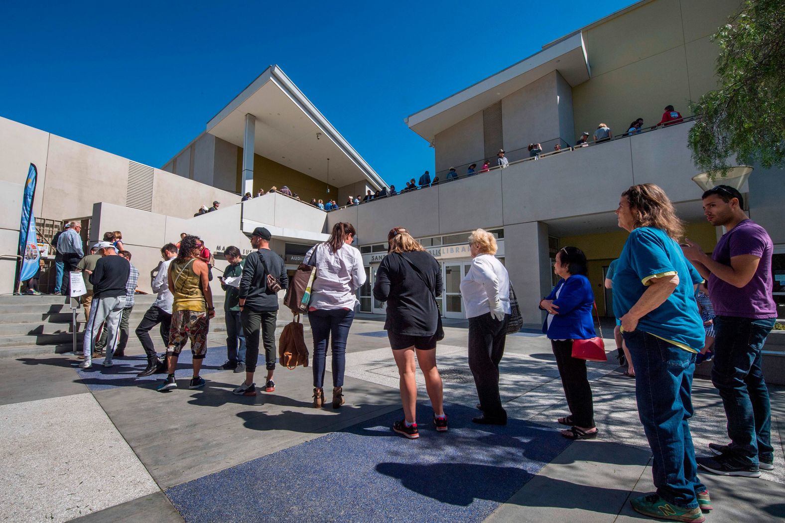People wait to vote in Santa Monica, California. In Los Angeles County, voters were given additional time to cast their ballots for candidates. Voters across the area reported long lines at polling centers.