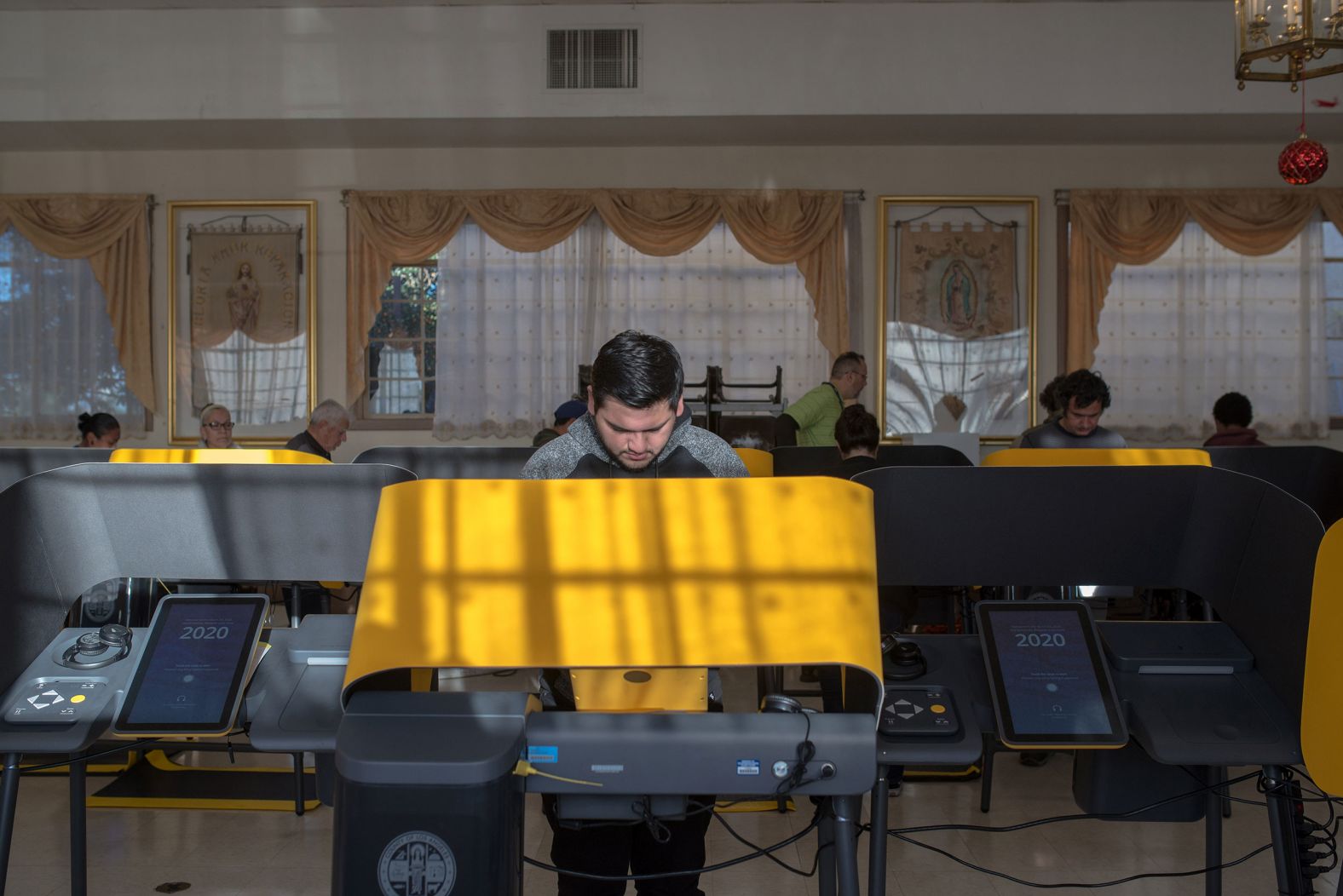 A man votes inside a Los Angeles church on Tuesday.