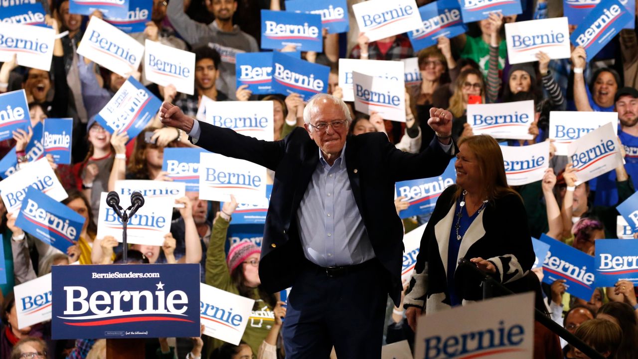 Democratic U.S. presidential candidate Senator Bernie Sanders is accompanied by his wife Jane as he arrives to speak at his Super Tuesday night rally in Essex Junction, Vermont, U.S., March 3, 2020. 