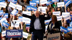 Democratic U.S. presidential candidate Senator Bernie Sanders is accompanied by his wife 