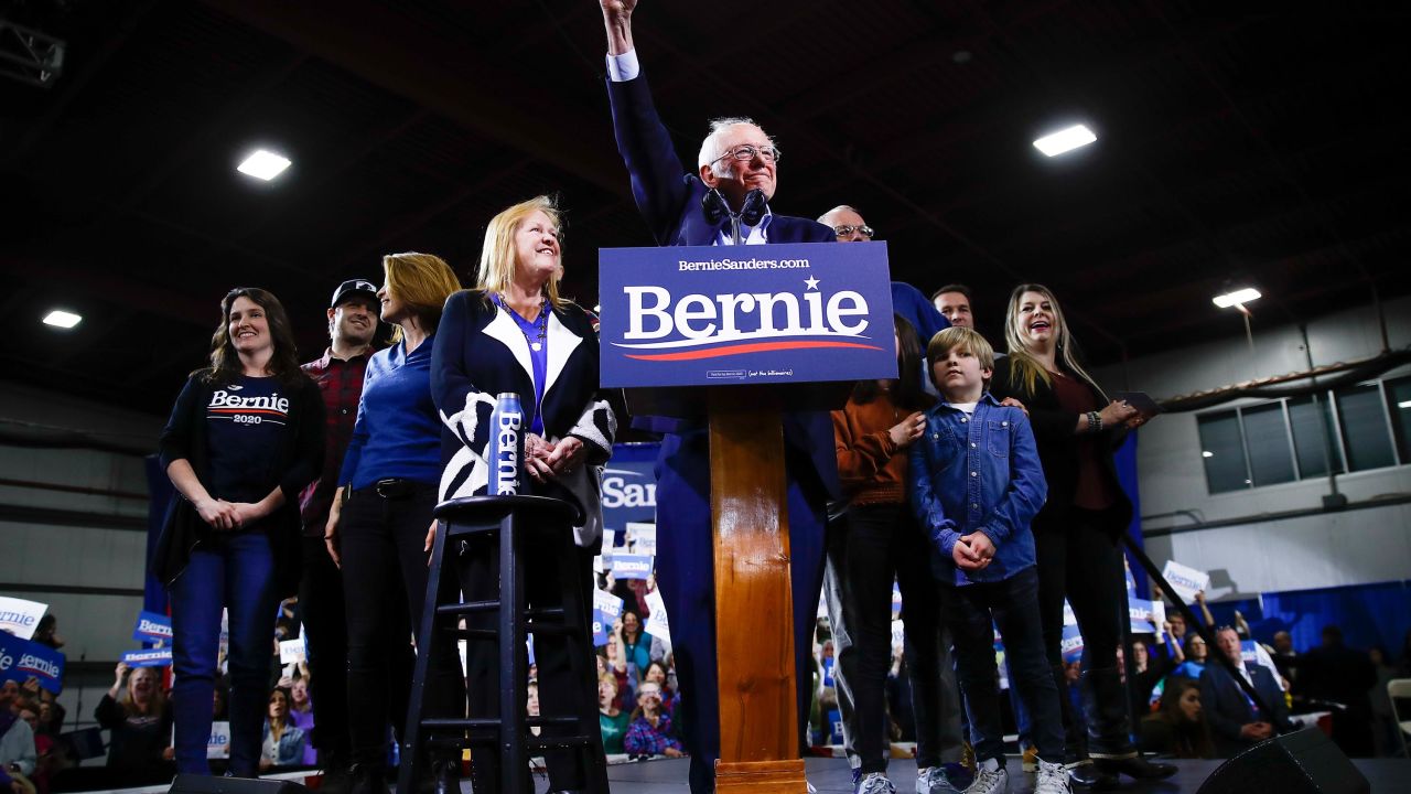 Democratic presidential candidate Sen. Bernie Sanders, I-Vt., accompanied by his wife Jane O'Meara Sanders and other family members, speaks during a primary night election rally in Essex Junction, Vt., Tuesday, March 3, 2020.