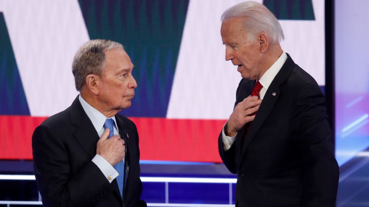 Democratic presidential candidates, former New York City Mayor Mike Bloomberg, left, and former Vice President Joe Biden talk during a break in a Democratic presidential primary debate Wednesday, Feb. 19, 2020, in Las Vegas.