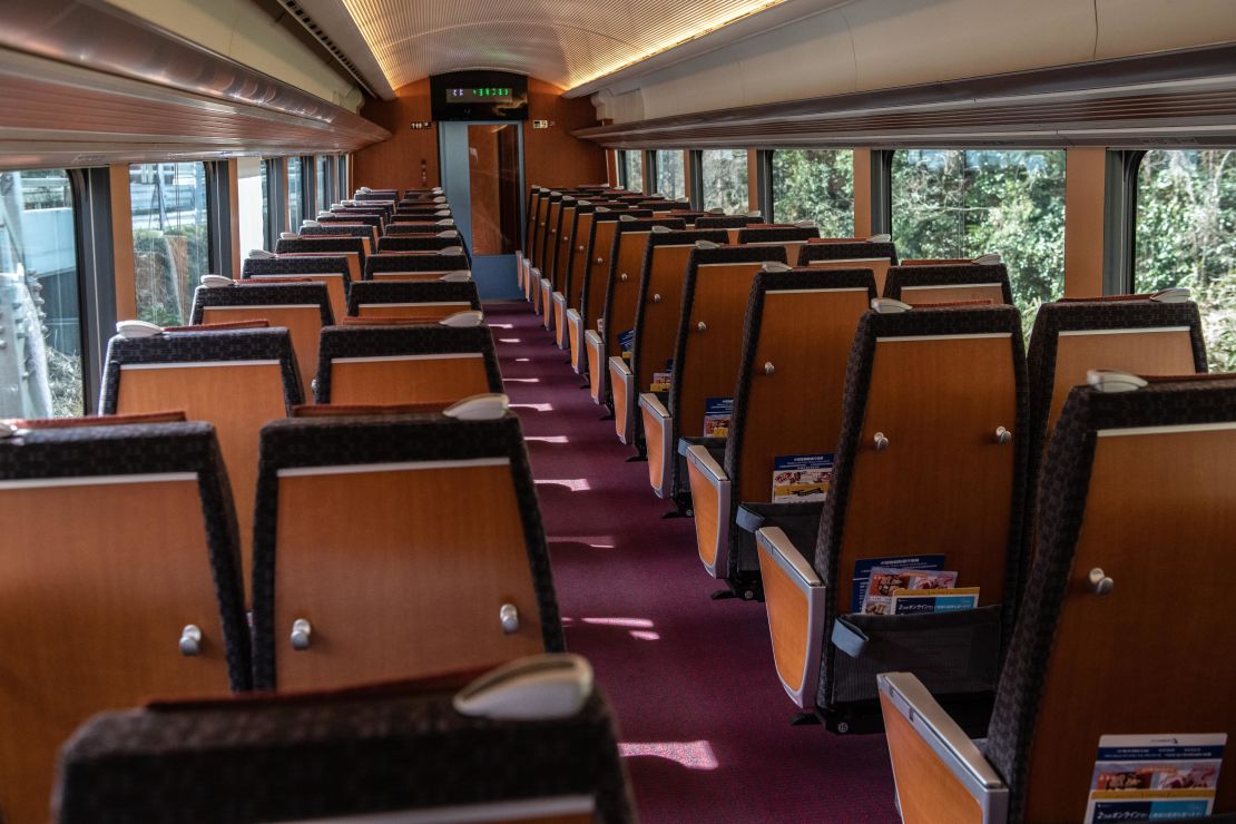 A carriage on a train is nearly empty as it travels from Shinjuku to the toursi resort of Hakone on March 3, 2020 in Hakone, Japan. 