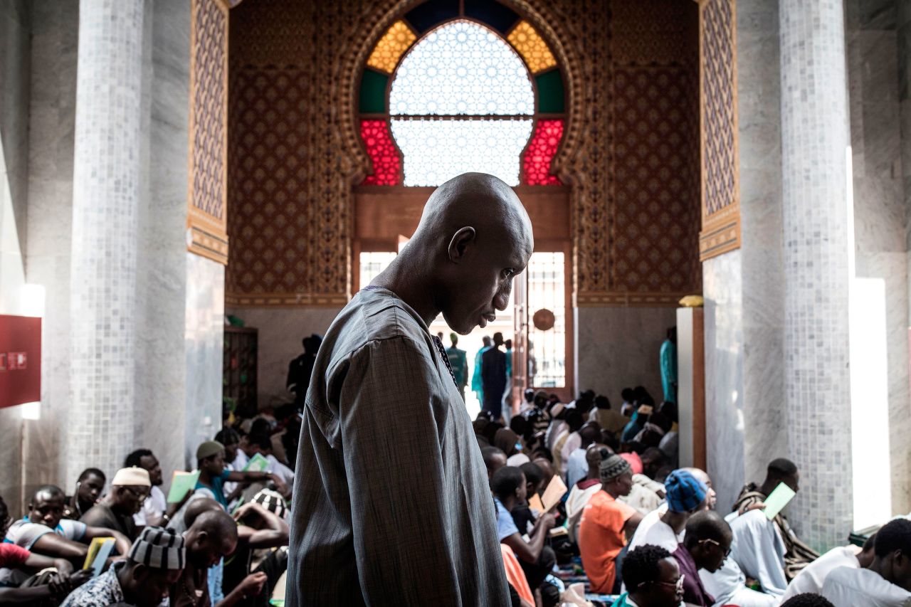 A Muslim worshipper attends a mass prayer against coronavirus in Dakar, Senegal, on March 4. It was after cases were confirmed in the country.