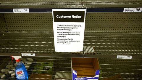 A notice posted on empty shelves of hand sanitizer in a supermarket in Sydney on Wednesday.