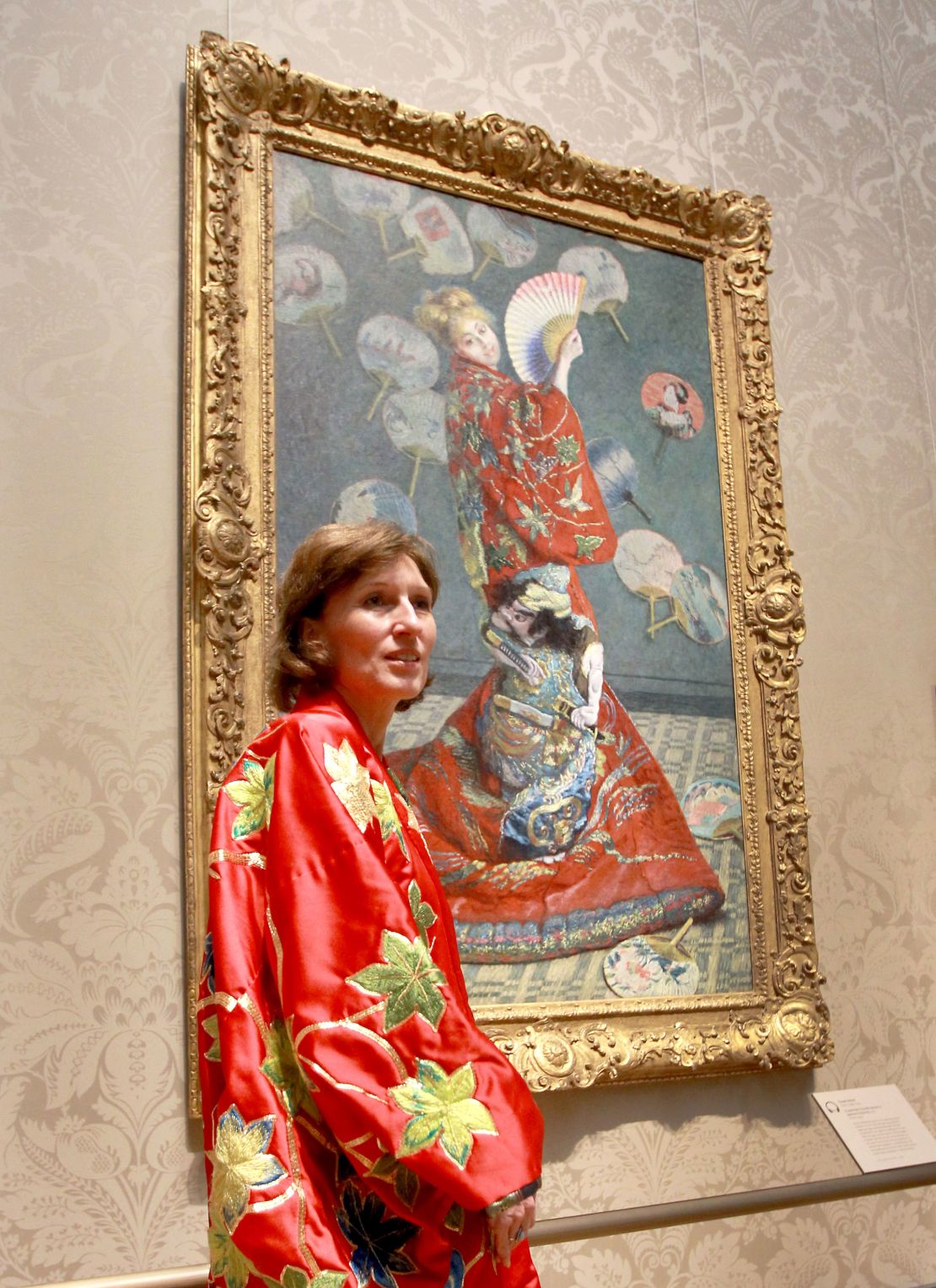 A museum visitor wears a museum-provided kimono in front of Claude Monet's "La Japonaise" at the Boston Museum of Fine Art in 2015.