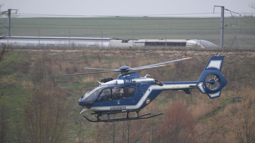A Gendarmerie helicopter flies near the site where a high-speed TGV train locomotive derailed close to Ingenheim early on March 5, 2020 while travelling from the eastern city of Strasbourg to Paris. - "The TGV locomotive went off the tracks near Ingenheim," around 30 kilometres (20 miles) northwest of Strasbourg, an SNCF spokeswoman said. 21 persons have been injured. (Photo by Patrick HERTZOG / AFP) (Photo by PATRICK HERTZOG/AFP via Getty Images)