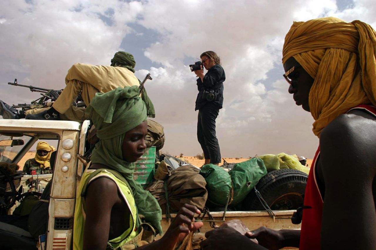 Lynsey Addario photographs rebels in Sudan's Darfur region in 2004. Addario has covered conflicts and humanitarian crises in many countries, including Afghanistan, Iraq, Libya, Syria and Somalia. Her work in Afghanistan contributed to a Pulitzer Prize that The New York Times won in 2009 for international reporting. Addario has been kidnapped twice while working in war zones. Her memoir, 