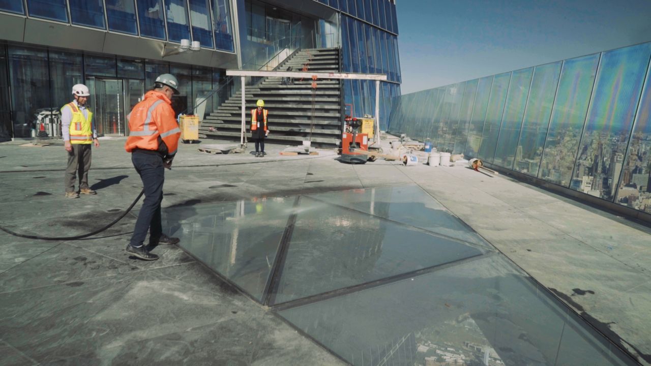 A picture taken during construction shows the glass floor in the center of the deck.