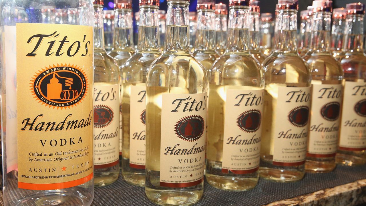 No, using Tito's Vodka does not replace washing your hands.