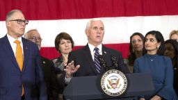 JOINT BASE LEWIS MCCHORD, WA - MARCH 05: US Vice President Mike Pence speaks during a news conference with Washington State Governor Jay Inslee (L) as Seema Verma (R), Administrator for the Centers for Medicare & Medicaid Services, looks on, March 5, 2020 in Joint Base Lewis McChord, Washington. They are joined by members of Washington state's congressional delegation, federal, state and local officials.†(Photo by Karen Ducey/Getty Images)