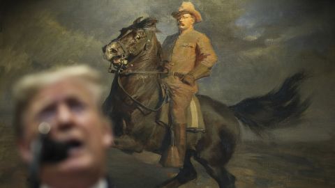 President Donald Trump announces changes to the National Environmental Policy Act in front of a portrait of his predecessor, Teddy Roosevelt, who pioneered conservation while in the White House.