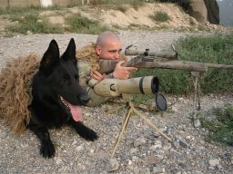 Wesley Black in Paktia Provence, Afghanistan in 2010 with military working dog "Blek."