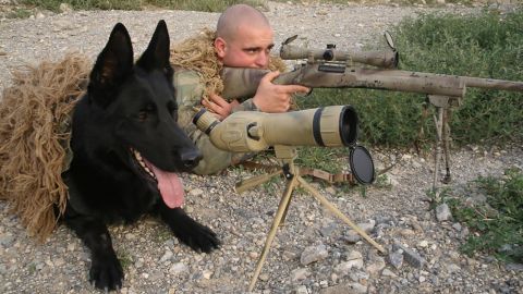 Wesley Black in Paktia Provence, Afghanistan in 2010 with military working dog "Blek."