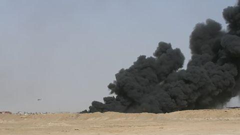 A burn pit image captured by Wesley Black in Ramadi, Iraq in 2005.