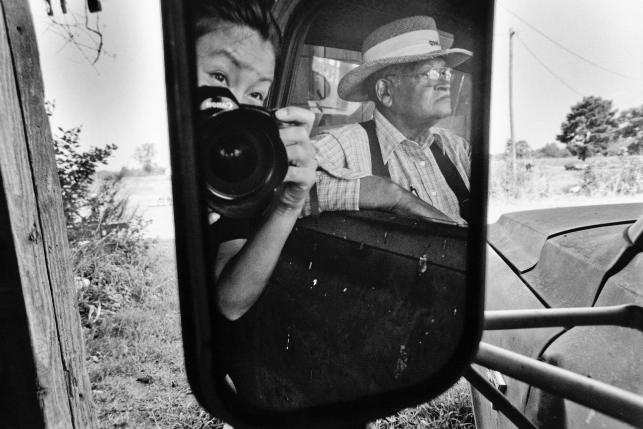 Yunghi Kim takes a photo while working on a project about black farmers in 1998. Kim, an award-winning photojournalist who has covered stories all over the world, started the <a href="https://trailblazersoflight.com/" target="_blank" target="_blank">Trailblazers of Light</a>, a website that celebrates women in her field and the contributions they've made. One of her most well-known projects was her story documenting South Korean "comfort women," sex slaves used by the Japanese military during World War II.