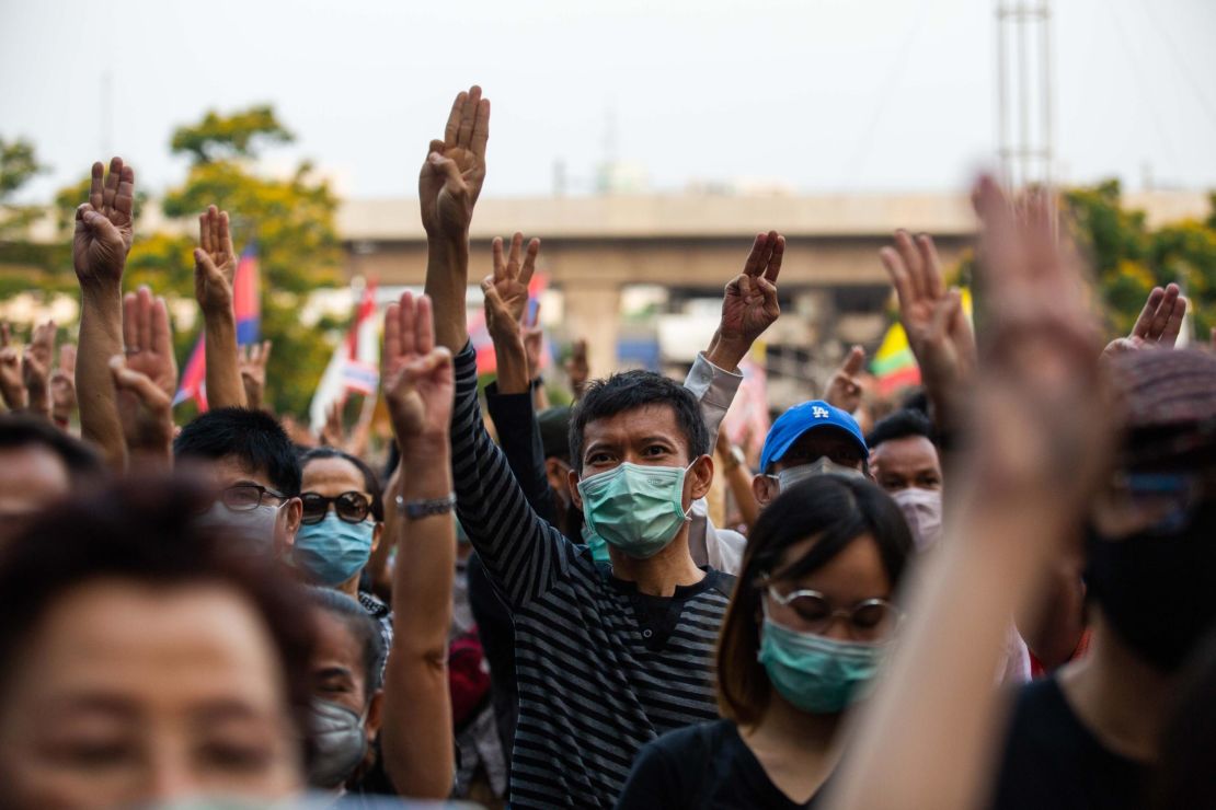 Thai people protest against the government with a three finger salute at Kasetsart University February 29, 2020 in Bangkok.
