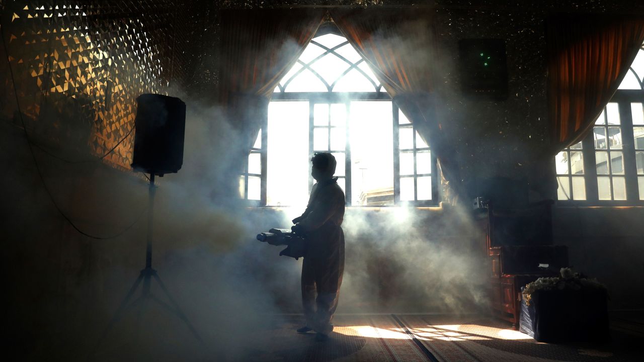 The shrine of Saint Saleh is disinfected to help prevent the spread of the new coronavirus in northern Tehran, Iran, Friday, March, 6, 2020. A Health Ministry spokesman warned authorities could use unspecified "force" to halt travel between major cities.  (AP Photo/Ebrahim Noroozi)