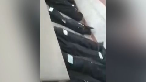 Social media footage shows bodies in a morgue in Qom, Iran.