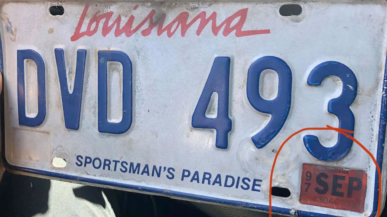 A Slidell Police Department officer pulled over a man for an expired license plate from 1997. 