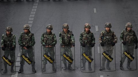 Thai soldiers deployed on a road leading to Victory Monument, the site of recent anti-coup protests on May 30, 2014 in Bangkok. 