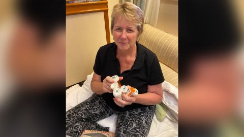 Kari Kolstoe with the medications she takes for her cancer.
