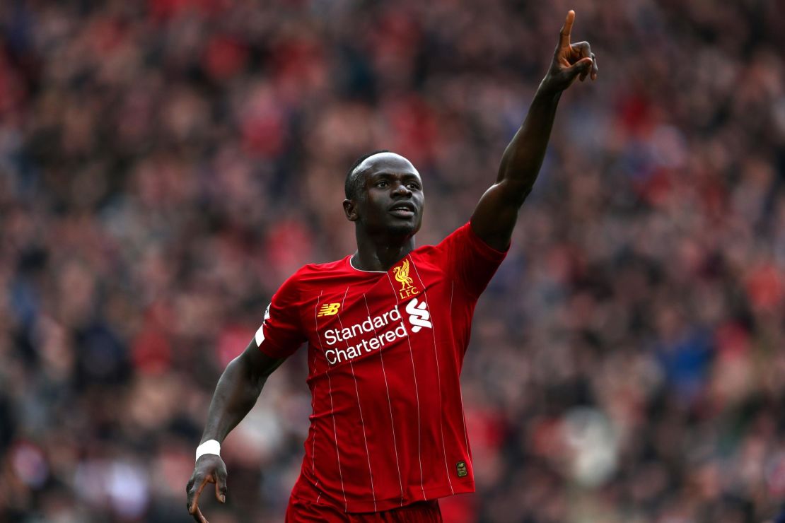 Sadio Mane celebrates after scoring his team's second goal during the Premier League match against Bournemouth at Anfield on March 07, 2020.