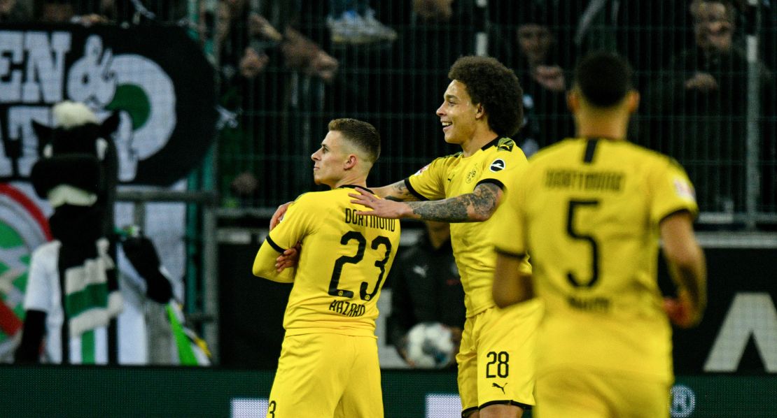 Dortmund's Thorgan Hazard celebrates his goal with his teammate and fellow Belgian midfielder Axel Witsel.