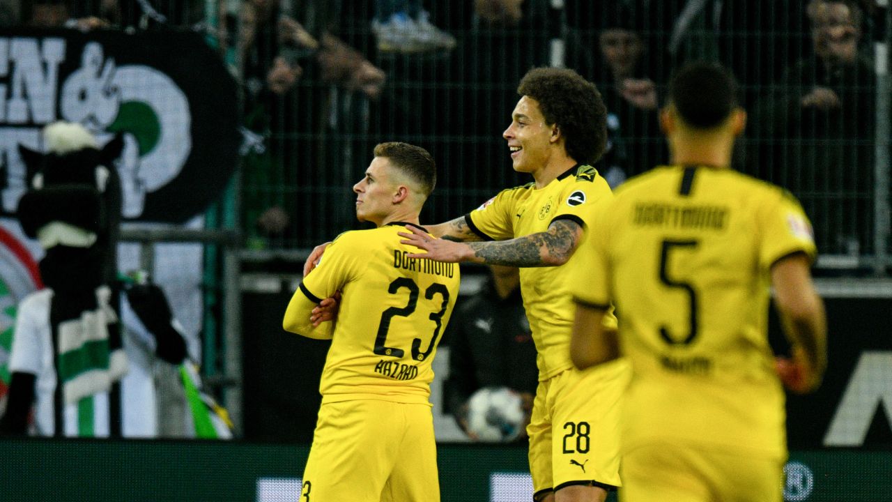 Dortmund's Thorgan Hazard celebrates his goal with his teammate and fellow Belgian midfielder Axel Witsel.