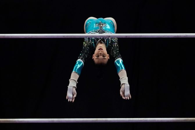 Giorgia Villa of Italy performs on the bars during the America Cup gymnastics competition March 7, in Milwaukee. 