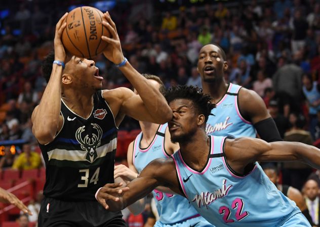 Milwaukee Bucks forward Giannis Antetokounmpo goes up for a shot against Miami Heat forward Jimmy Butler in the first quarter in Miami on March 2.