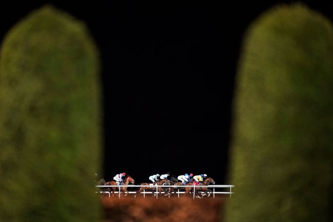 Frankie Dettori riding Cemhaan leads the pack at The 32Red Casino Novice Stakes at Kempton Park Racecourse on March 4 in Sunbury, England.