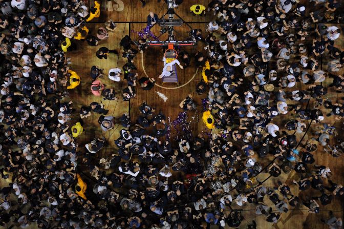 Utah State Aggies head coach Craig Smith throws the net to his players after defeating the San Diego State Aztecs in the Mountain West Conference tournament final in Las Vegas on March 7. <a href="index.php?page=&url=https%3A%2F%2Fwww.cnn.com%2F2020%2F03%2F02%2Fsport%2Fgallery%2Fwhat-a-shot-0301%2Findex.html" target="_blank">See 26 amazing photos from last week.</a>