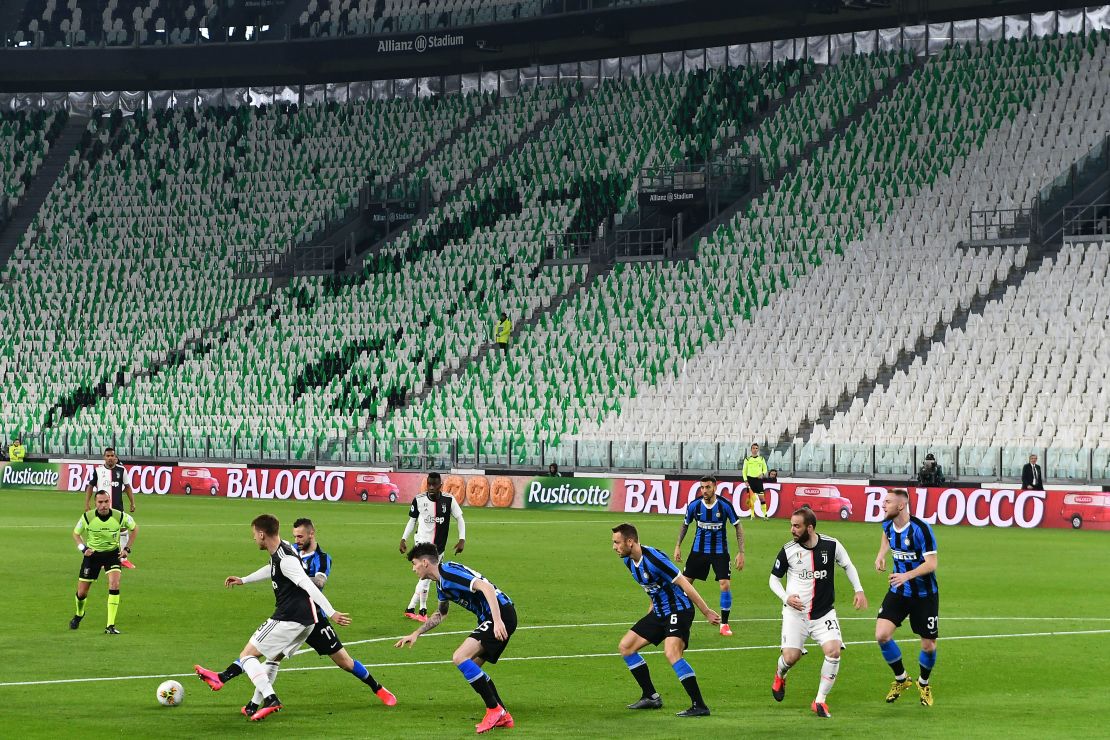 Inter Milan and Juventus players compete in an empty stadium due to the novel coronavirus outbreak.