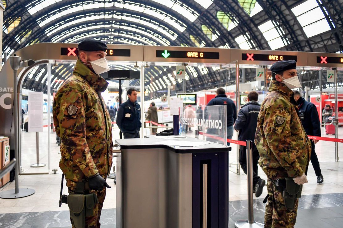 Italian soldiers patrol at Milan's main train station on March 9, after Prime Minister Giuseppe Conte signed a quarantine order for the country's north. The lockdown was later expanded to cover the entire country.