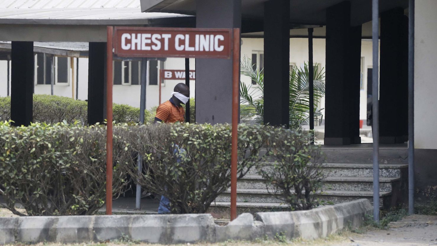A man wearing face mask walks at the Yaba Mainland hospital, where an Italian citizen who entered Nigeria from Milan on a business trip, the first case of the COVID-19 virus, was treated in Lagos, Nigeria. 