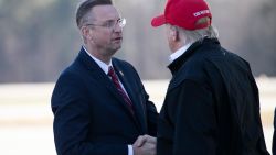 Rep. Doug Collins, R-Ga., greets President Donald Trump as he steps off Air Force One during arrival, Friday, March 6, 2020, at Dobbins Air Reserve Base in Marietta, Georgia.