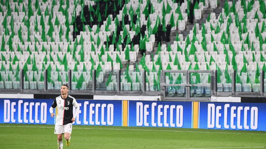 TOPSHOT - Juventus' Portuguese forward Cristiano Ronaldo runs on the pitch in an empty stadium due to the novel coronavirus outbreak during the Italian Serie A football match Juventus vs Inter Milan, at the Juventus stadium in Turin on March 8, 2020. (Photo by Vincenzo PINTO / AFP) (Photo by VINCENZO PINTO/AFP via Getty Images)